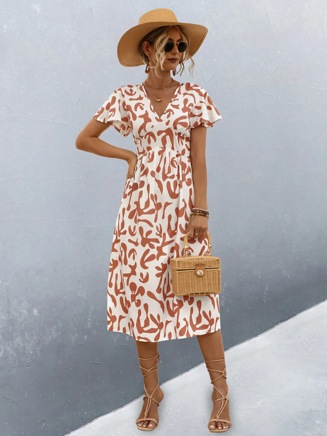 Robe longue cintrée à taille haute en lin, motif abstrait
