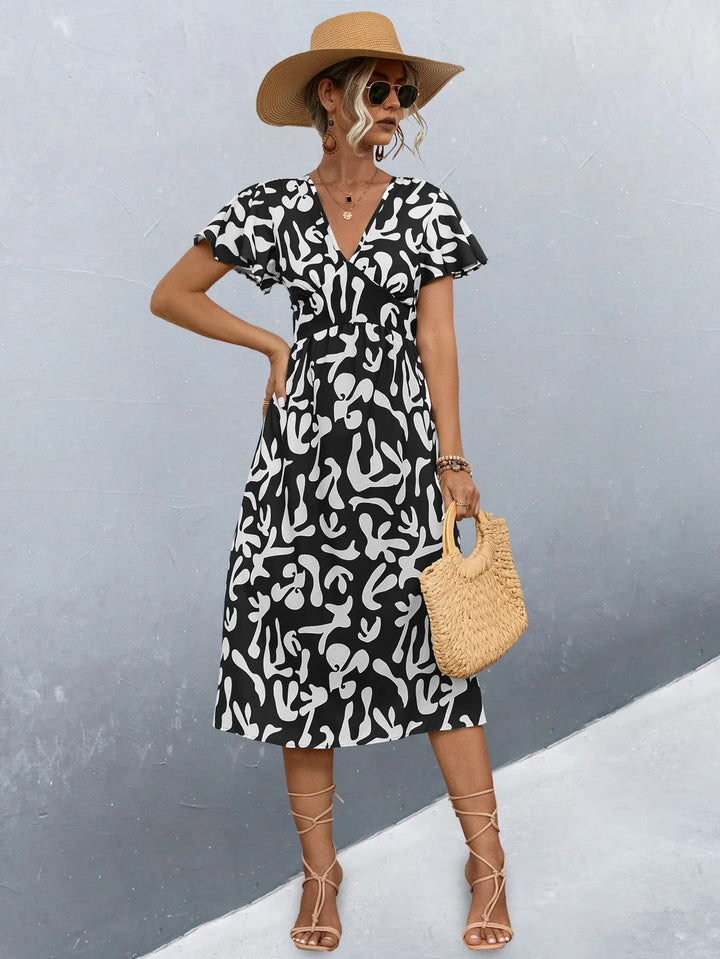 Robe longue cintrée à taille haute en lin, motif abstrait